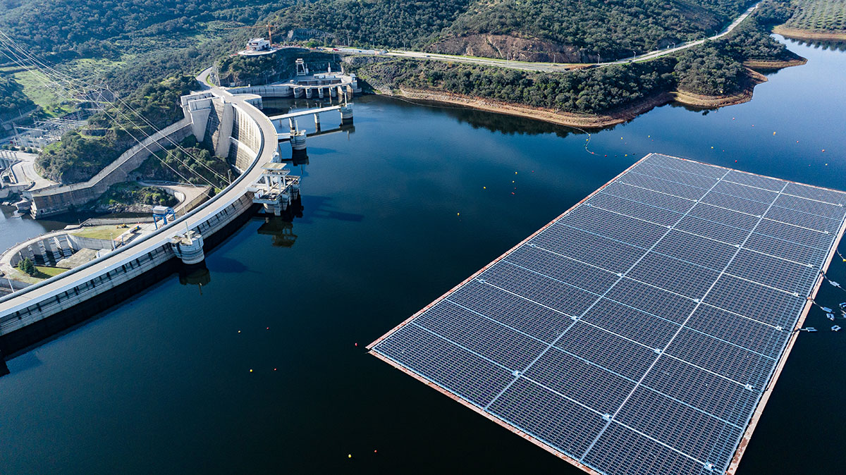 Aerial view of hydro dam and solar farm